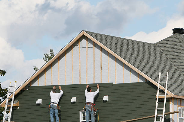 Professional Siding Contractor technician working in Arlington, MA